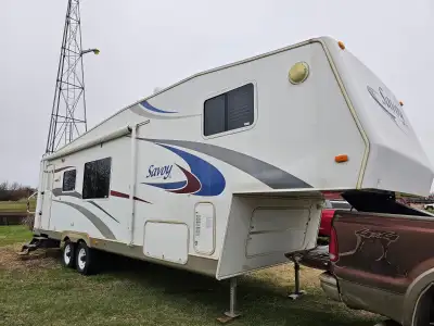 MUST GO!! 30ft. Holiday Rambler Savoy SL 30RKS fifth wheel trailer. Spacious and bright. Has one lar...