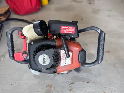 Gas powered ice auger No flight Motor runs strong with good compression when last ran Carb needs wor...
