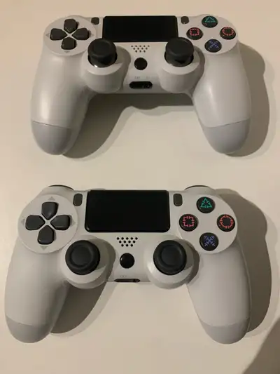 For Sale: PS4 Controllers x2 (White) $60, View more