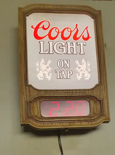 11" x 16" Digital Wall Clock Clock works well, in good condition. Key holes in the back for hanging....
