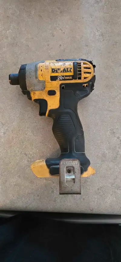 This is a used DeWalt 20V MAX impact driver, ready to tackle your toughest jobs! It's seen some acti...