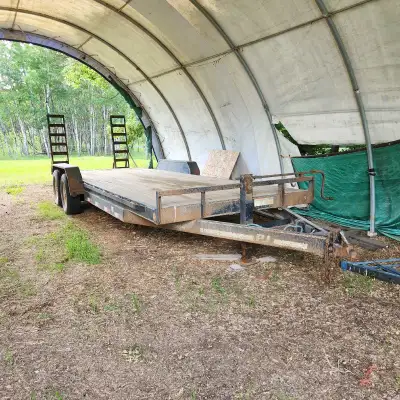 22ft PJ equipment hauler. 20ft deck, 2ft dovetail 7ft between fenders. Fir deck flip up ramps. 2 700...