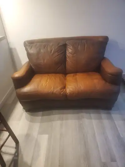 Leather Love seat $100.00, View more