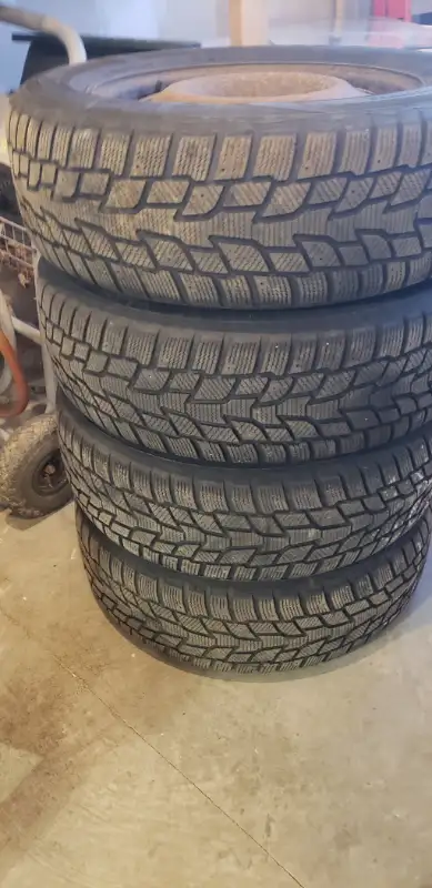 4 used winter tires on rims in good condition.