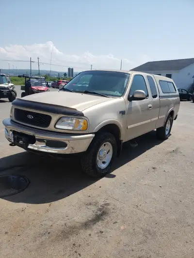 1998 ford f150 4x4 4.6L, was purchased new from Steve Marshall ford in BC, so rust wise it's in amaz...