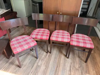 These chairs feature a sturdy wooden frame with a cozy, plaid fabric seat. Perfect for adding a touc...
