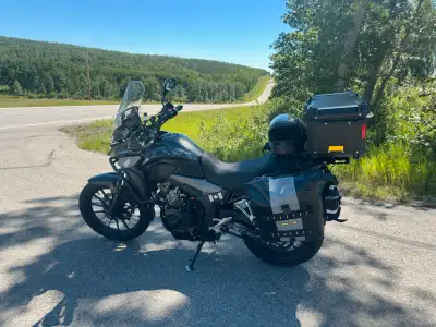 2020 Honda CB 500 X with 21,000 km on it crash bars and luggage racks soft bags and hard box. very g...
