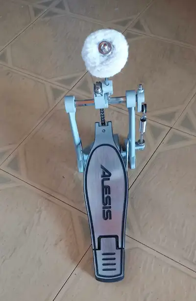 This pedal has a soft beater that makes the kick drum sound thicker.