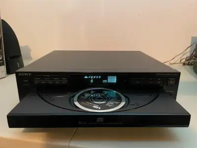 Model: CDP-C225 CD Changer Capacity : 5 Year Manufactured: 1992 Surround Sound Audio Outputs: Headph...
