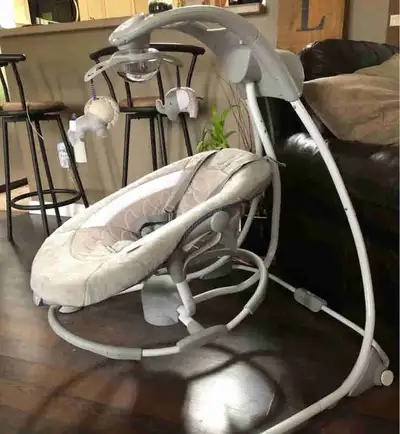 Ingenuity brand Baby swing Swings front to back or side to side Seat detachable Music, mobile, light...