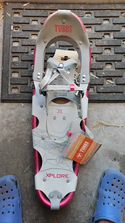 Two pairs of snow shoes, View more