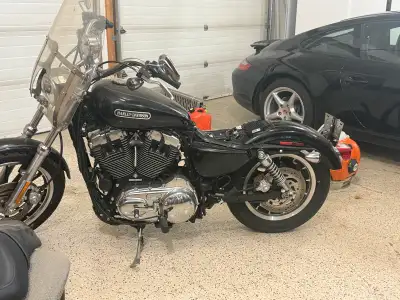 I need help installing battery on 2011 Harley Sportster. West Edmonton