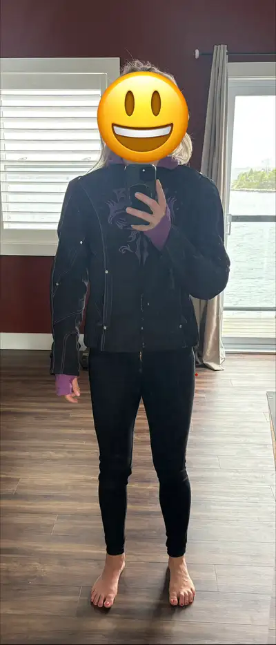 Size Small, women’s black and purple (Diva) synthetic motorcycle jacket. Bought a few years ago but...