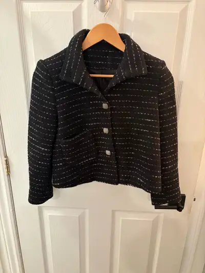 This is a stylish, used ba&sh jacket, perfect for adding a touch of French chic to your wardrobe, fe...