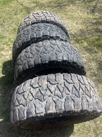 LT tires, size is almost 35" (for 18" rims)