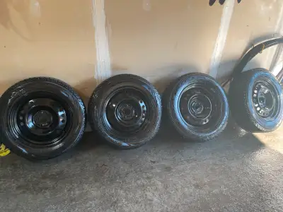 Four winter tires and rims that were lightly used on second vehicle. Great condition. Tread wear and...