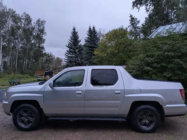 4WD Honda Ridgeline (high milage)