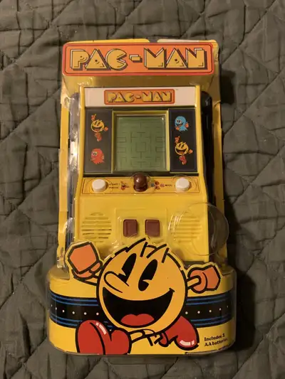 6” Pac-man Retro Mini Arcade Handheld Game Classic. Only used a couple times and put back in the pac...