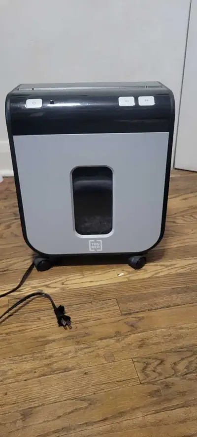 I'm selling a Tru Red paper shredder in used condition, perfect for home or office use. It features...