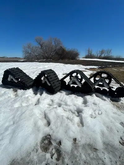 Enhance your ATV's off-road capabilities with these used kimpex XTR ATV Tracks, designed for superio...