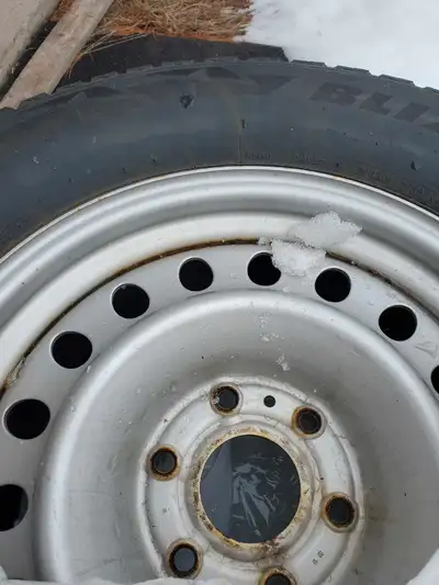 4 steel 18 inch rims with goodyear blizzard tires and sensors. The rims were on a 22 dodge ram sport...