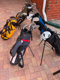 Youth Golf club sets - each has a Driver, long iron, short iron