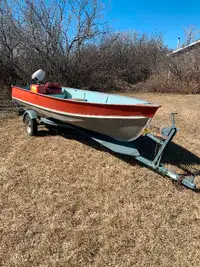 Boat motor and trailer