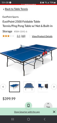 Table de ping-pong avec raquettes et bo