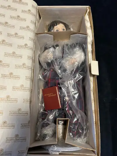 This is a beautiful item. Ashton Drake doll. The name is Jo and this doll. It is porcelain and handc...