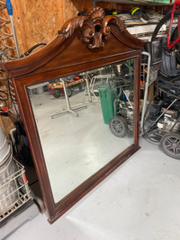 Large mirror in a ornate solid wood frame 42 by 36 inches 