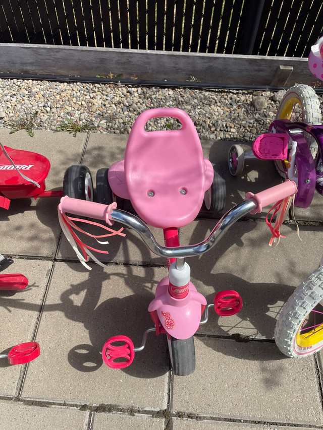 Pink kids trycicld / trycicle pour enfants rose  dans Enfants  à Laval/Rive Nord