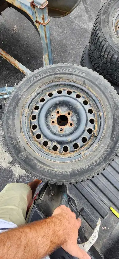 Selling set of 4 used winter tires on rims. Lots of tread life left. They are 225/65/R17 general alt...