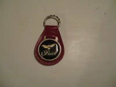 A vintage BUICK KEYCHAIN & in very good condition. Reverse is marked Fine Top Grain Leather. In my c...