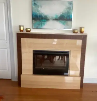 This unique fireplace will add to any decor! It measures 64 in. wide, 51 in. high, and 12 inches dee...