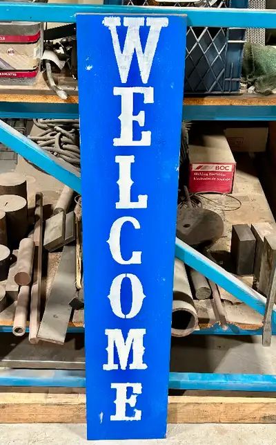 For sale is a lovely solid wood “Welcome” porch sign. Stands 48” tall, 9.25” wide, and 0.75” deep. A...