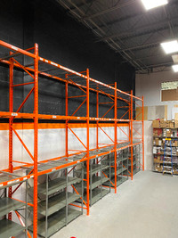 Used pallet racking and industrial shelving units.