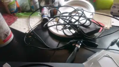 PS3 with 1 game and one free Wii game , View more