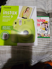 Instax mini 9 camera and 1 package of film