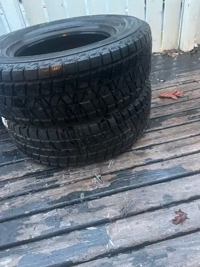 Set of 2 Weathermate Arctic 235/70R16 106Q winter tires in good condition with strong tread remainin...