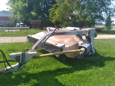 5209 New Idea Discbine for sale. 9’ cut. Rubber rolls. New knives. Works good, just cut hay with it.