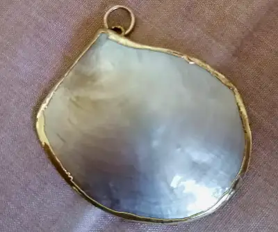 Sea shell pendant with gold rimmed, View more
