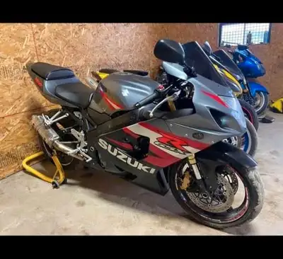Suzuki GSXR 750 2004, a sleek and powerful sportbike, This bike has been well-maintained, Looking at...