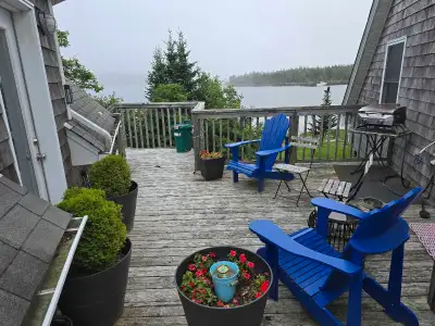 This cozy one-bedroom apartment features a stunning private deck with picturesque water views, offer...