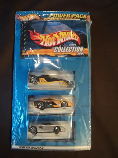 This 3 pack comes with a black & yellow Greased Lightening, yellow Dodge Charger RT, and a silver Lo...
