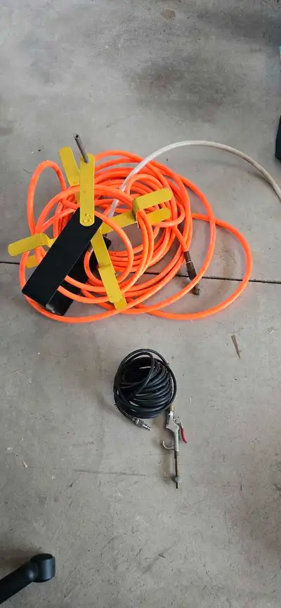 This is an orange air compressor hose with a black air hose and nozzle. All items. 50 feet line Pric...