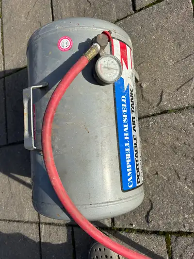This Campbell Hausfeld portable air tank, with a 7-gallon capacity, is ideal for a variety of inflat...