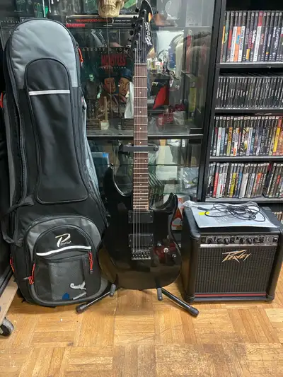 Peavey AT-200 Electric Guitar + Peavey Rage 158 Amp, View more