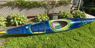 Northern Lights Canadian made 16 ft sea kayak. Two watertight hatches, light weight, smooth gliding....