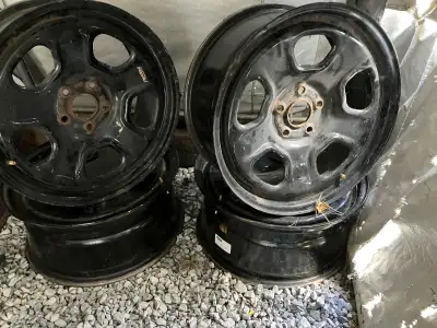 Used for 2 winters and have sat since last spring. 18 x8 inch OEM Ford wheels with valve stems for A...