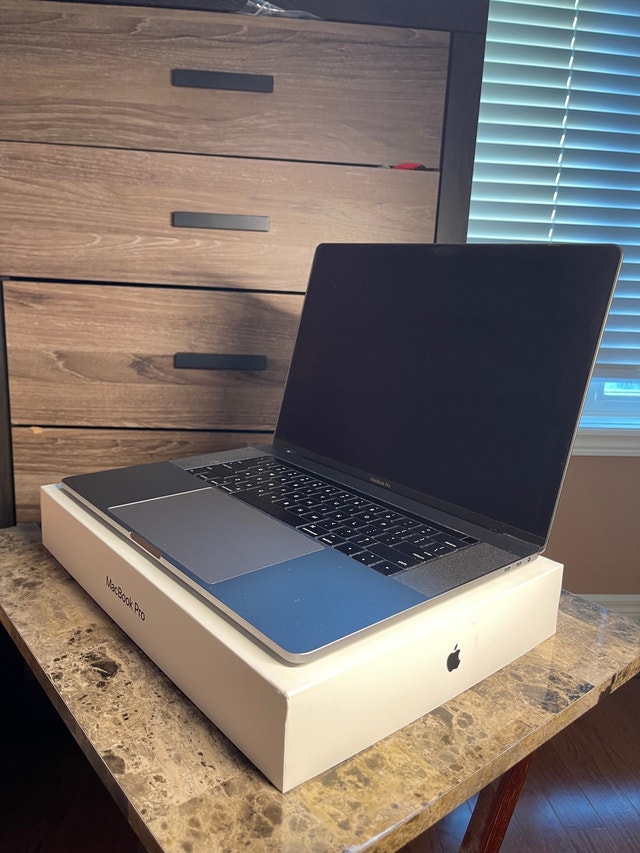 15” MACBOOK PRO with TOUCHBAR Price Negotiable Laptops Markham